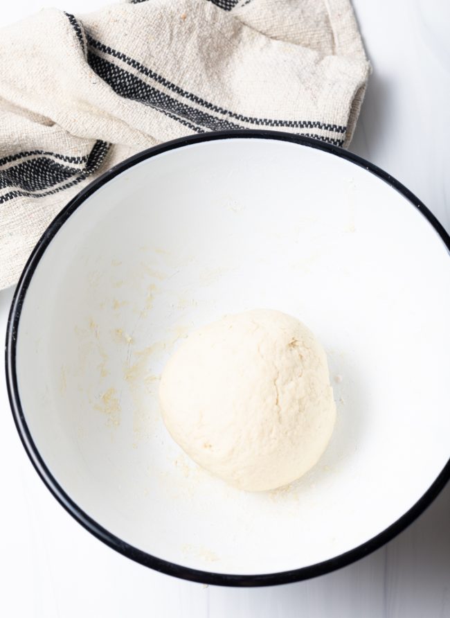 Navajo fry bread dough in a ball in a mixing bowl. 