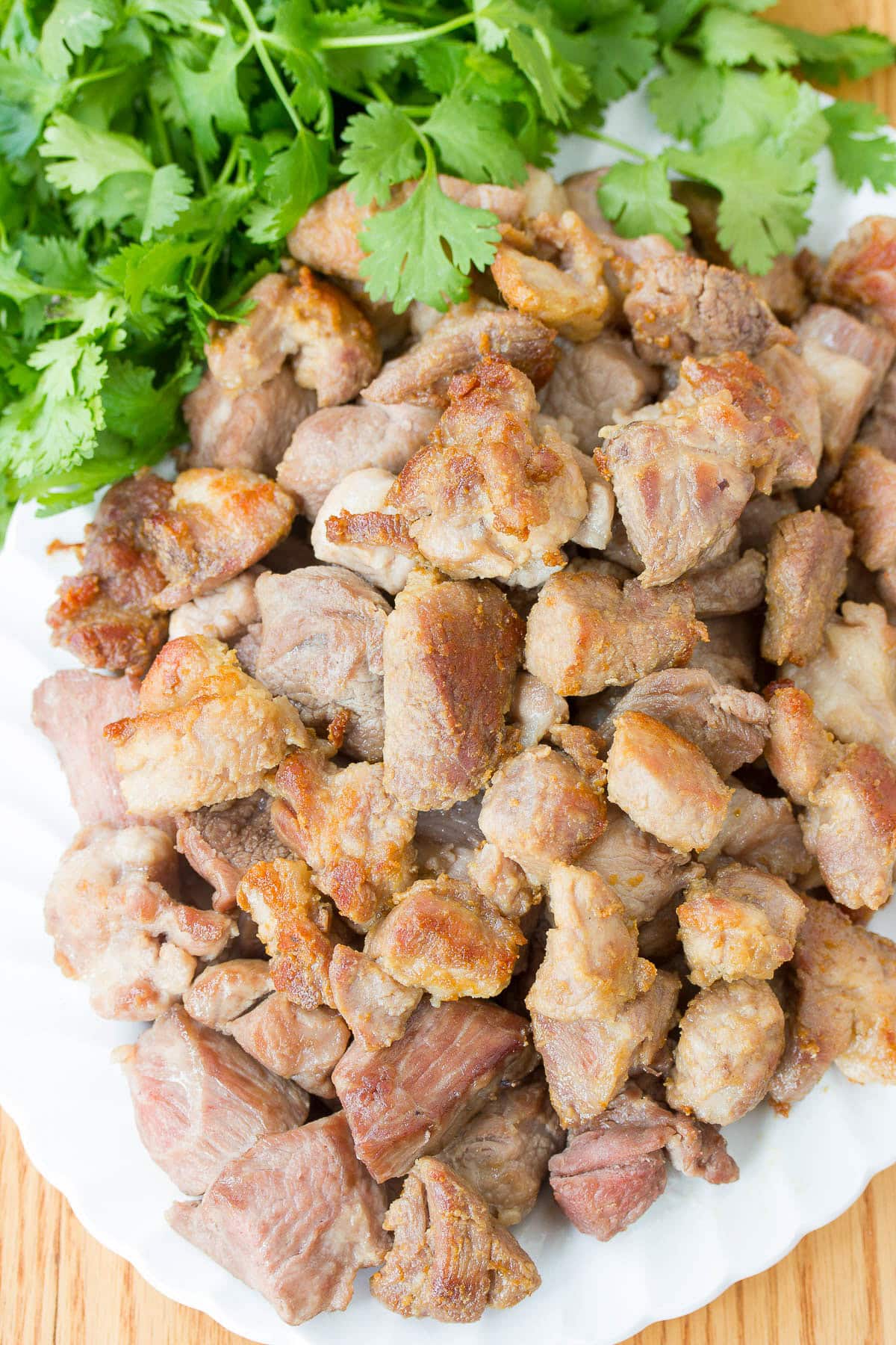 Diced pork pieces after being browned for Pork Green Chili