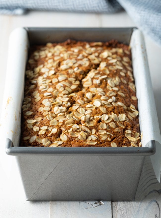 Banana bread in a loaf pan after being baked. 