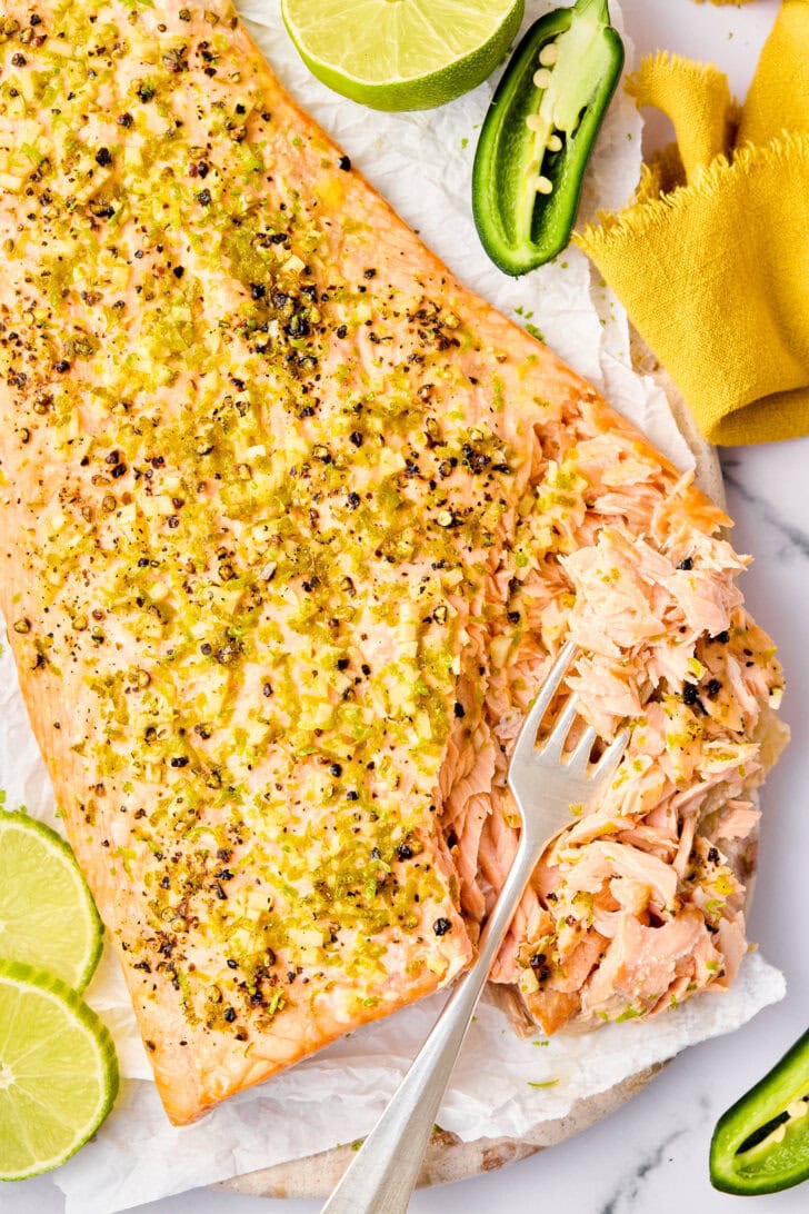 Oven Baked Salmon with spices, cut open with fork.