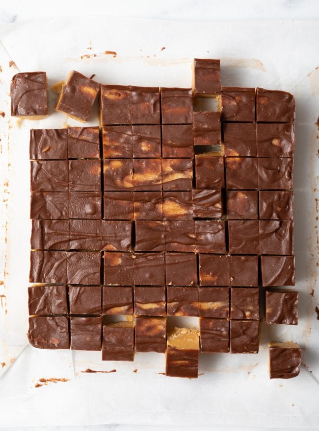 top view chocolate peanut butter fudge cut into 1 inch squares