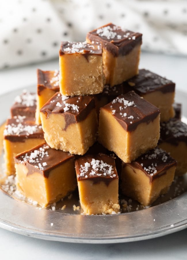 stacked Chocolate Peanut Butter Candyy with chocolate on a silver plate