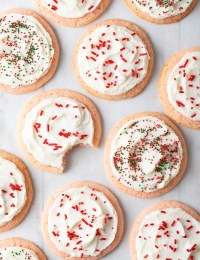 Peppermint Frosted Sugar Cookies Recipe: Soft Peppermint Cookies with Easy Cookie Frosting! This is a brilliant sugar cookie variation for the holidays! #ASpicyPerspective #cookies #sugarcookies #peppermint #mint #holidays #christmas #cookie