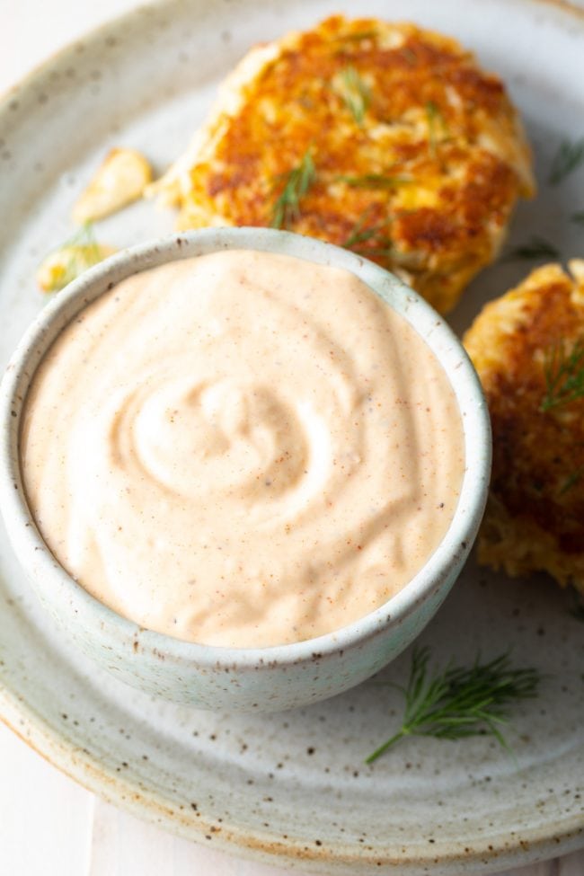 Baked crab cakes served with remoulade on the side