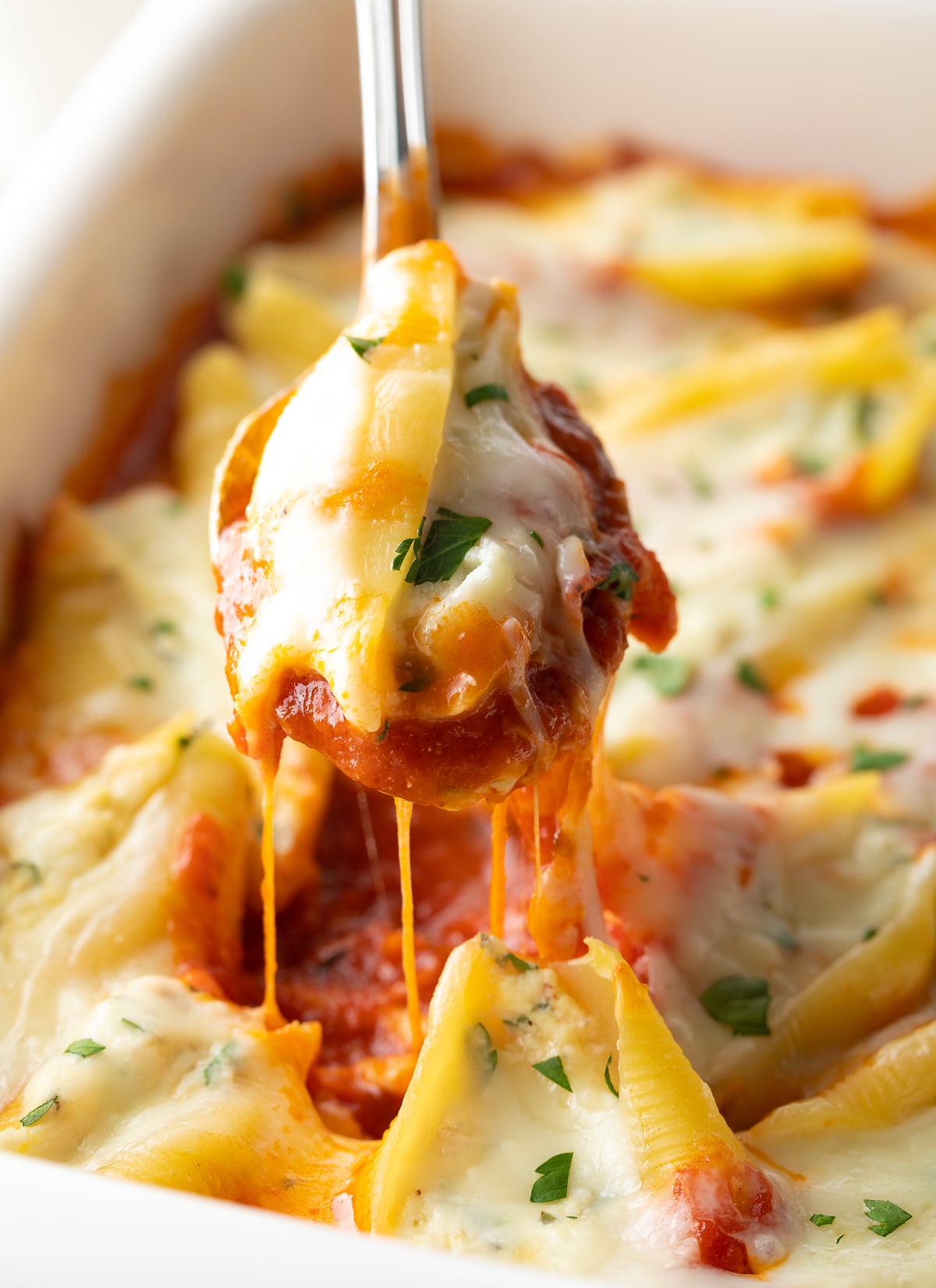 Slow Cooker Stuffed Shells Recipe #ASpicyPerspective #stuffed #shells #ricotta #holiday #italian #comfortfood #pasta #baked #slowcooker #crockpot