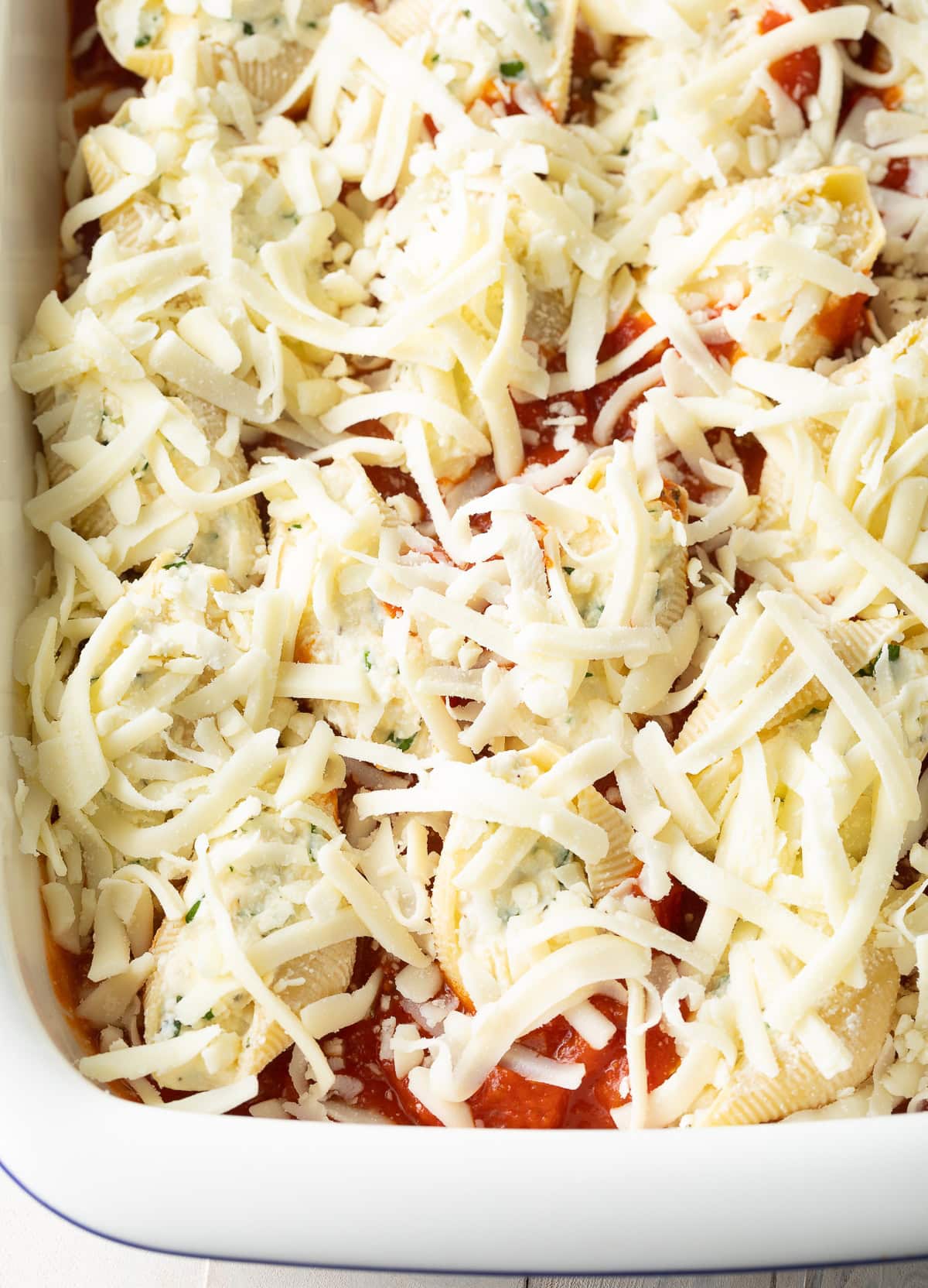 Cheesy Ricotta Stuffed Shells Recipe in pan ready to bake