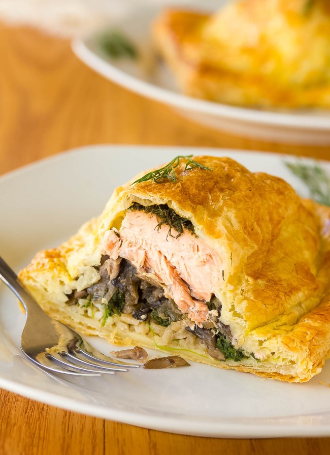 Holiday Salmon Wellington (salmon en croute) cut open to expose the layers