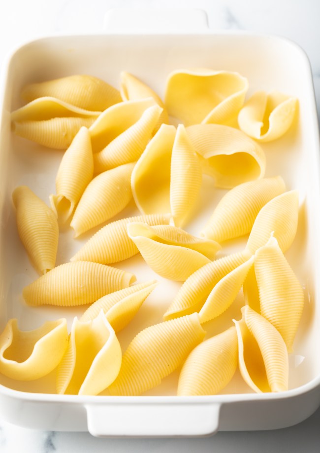Boiled large pasta shells.