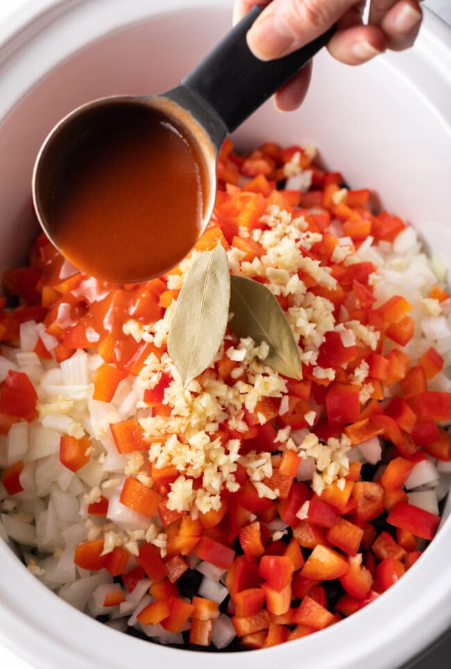 all ingredients going into slow cooker