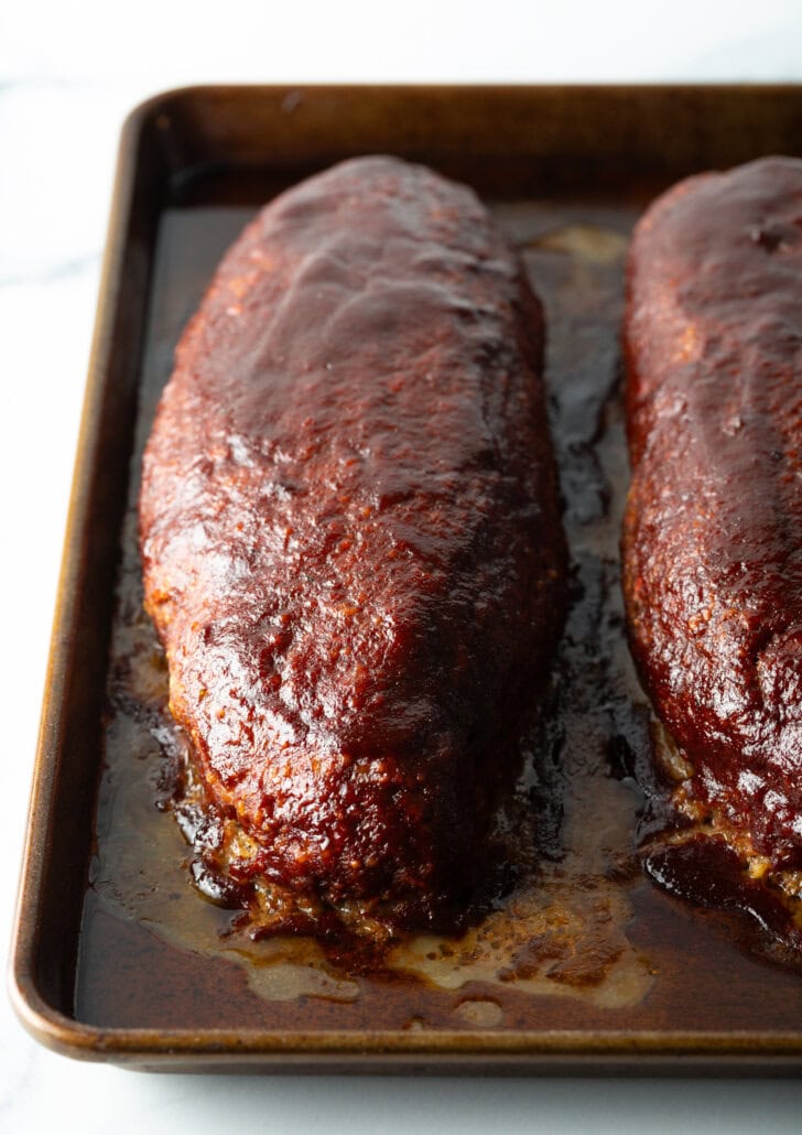 Top down view of two meatloafs from the smoker.