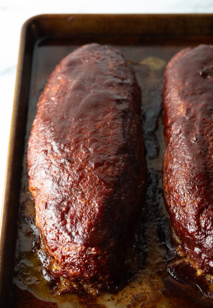 Top down view of two meatloafs from the smoker.