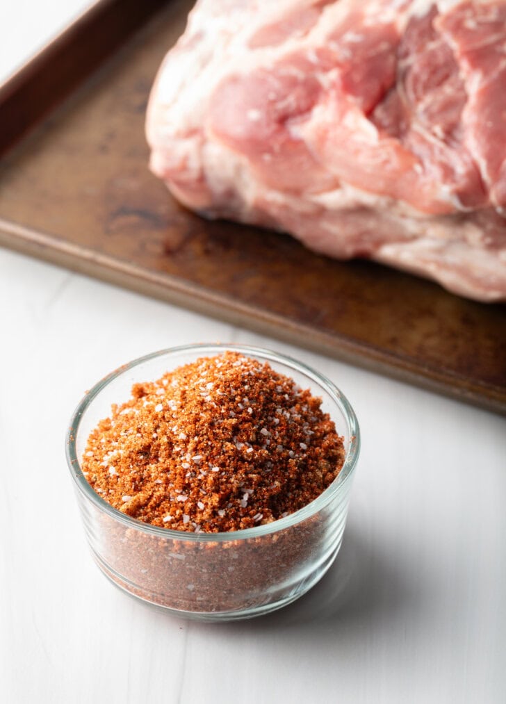 Blend of dry spice rub seasonings in a glass bowl.