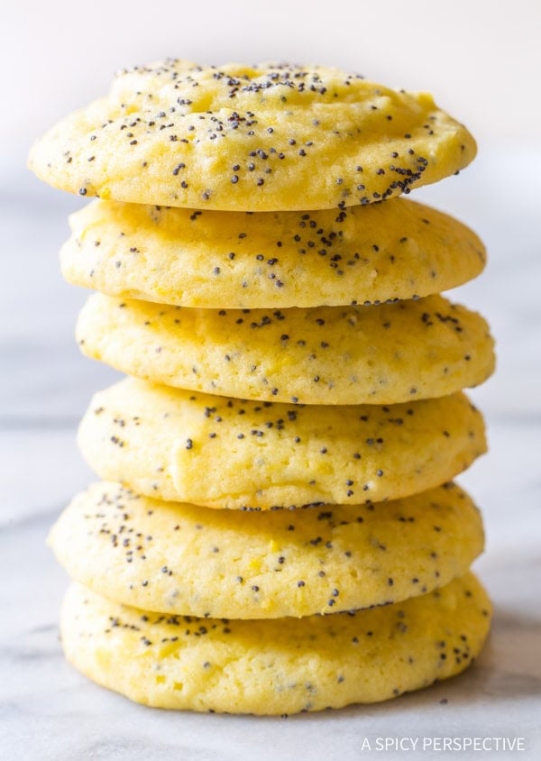 Lemon poppy seed cookies stacked on top of each other. 