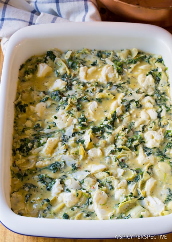 Topped with Parmesan #ASpicyPerspective #Egg #Casserole #EggCasserole #EggCasserole Recipe #Breakfast #Quiche #Artichoke #Spinach #ArtichokeSpinach #Ricotta #GlutenFree #LowCarb #Vegetarian
