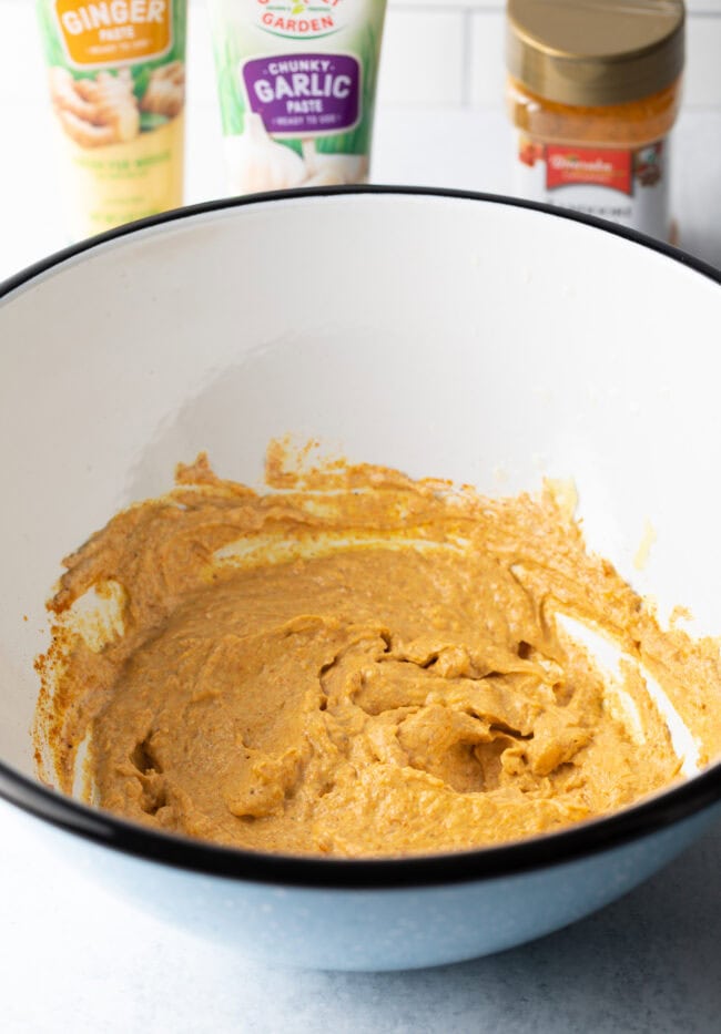 Coating mixture with yogurt and spices.