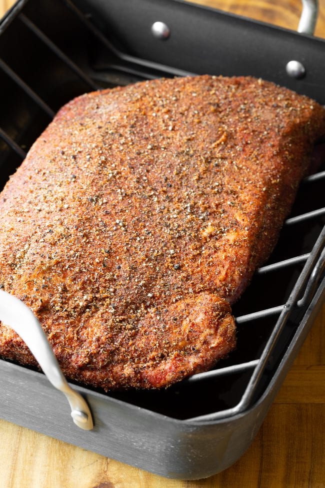 Oven beef brisket on a roasting pan with a rack. 