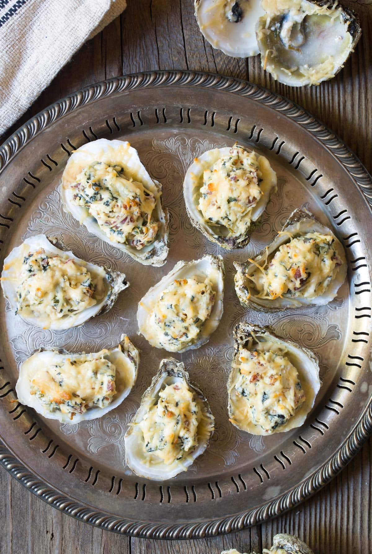 Cheesy Baked Oysters Recipe In The Half Shell - Overhead view on tray