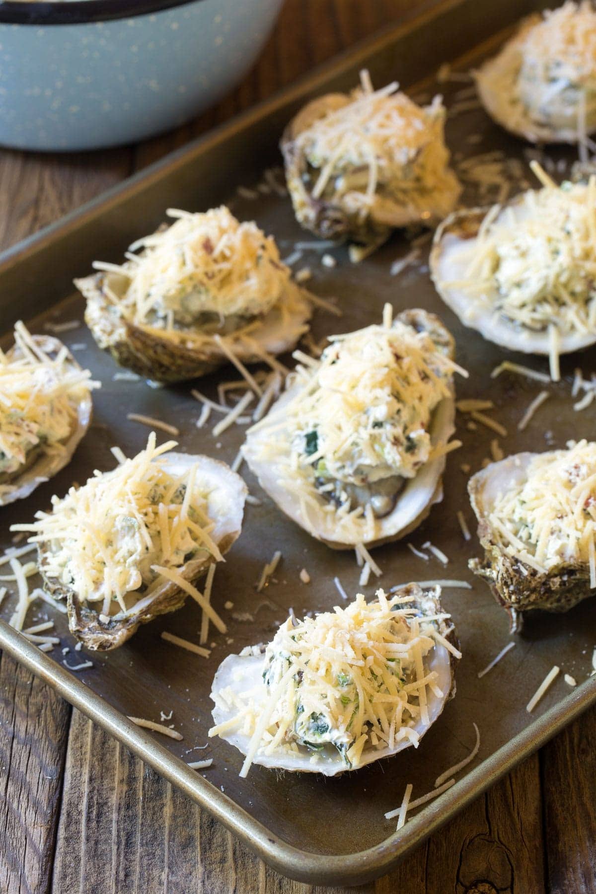 Baked oysters with cheese on tray