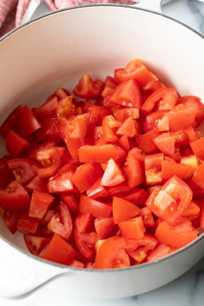 Chopped tomatoes in a dutch oven. 