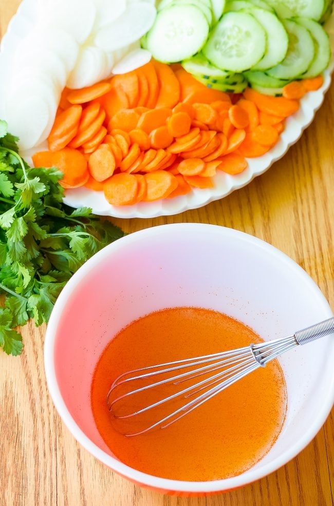 banh mi ingredients with marinade in bowl