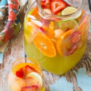 Summer White Sangria with Melon, Ginger Liqueur and Berries! #sangria #summer #cocktails #party