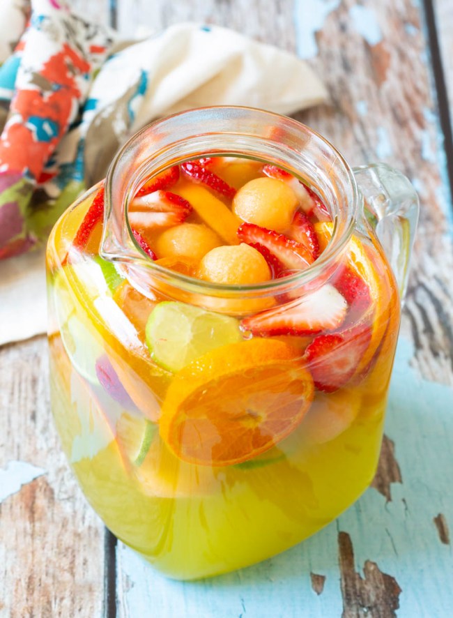 white sangria recipe mixed in a pitcher